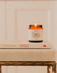 Bougie parfumée Camphre et Cachemire 4 oz dans un contenant en verre ambré