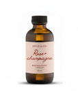 Bain moussant Rose et Champagne 115 ml dans un flacon.
