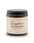Bougie parfumée Camphre et Cachemire 4 oz dans un contenant en verre ambré