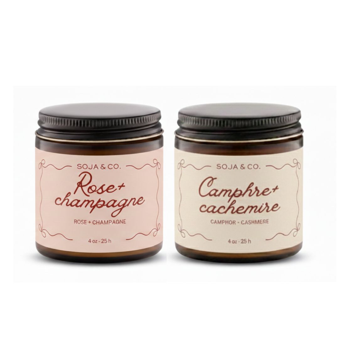 Ensemble de deux bougies parfumées : Rose et Champagne et Camphre et Cachemire, dans des contenants en verre